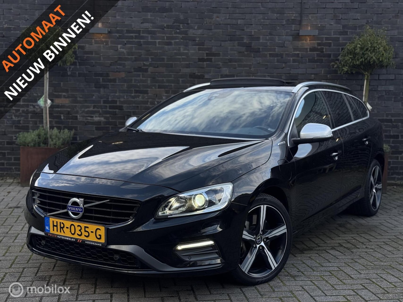 Volvo V60 - 2.4 D6 Twin Engine R-Design -BOMVOL- *INRUIL MOGELIJK* - AutoWereld.nl