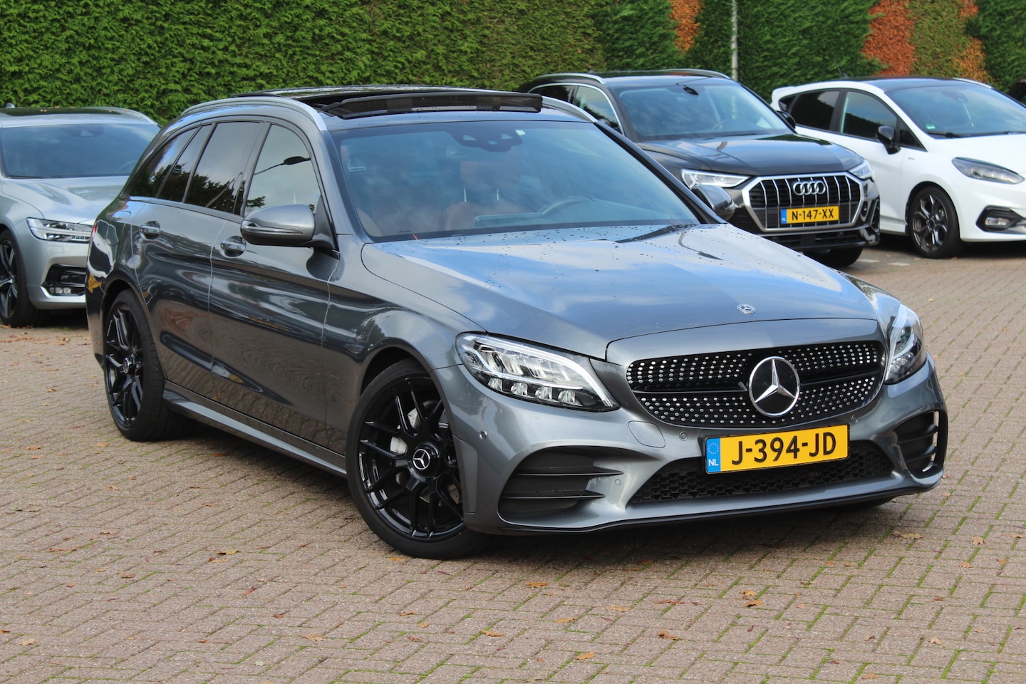 Mercedes-Benz C-klasse Estate - 180 Business Solution AMG / Panoramadak / Camera / Leder / Navigatie / 18'' / DAB / Stoelv - AutoWereld.nl