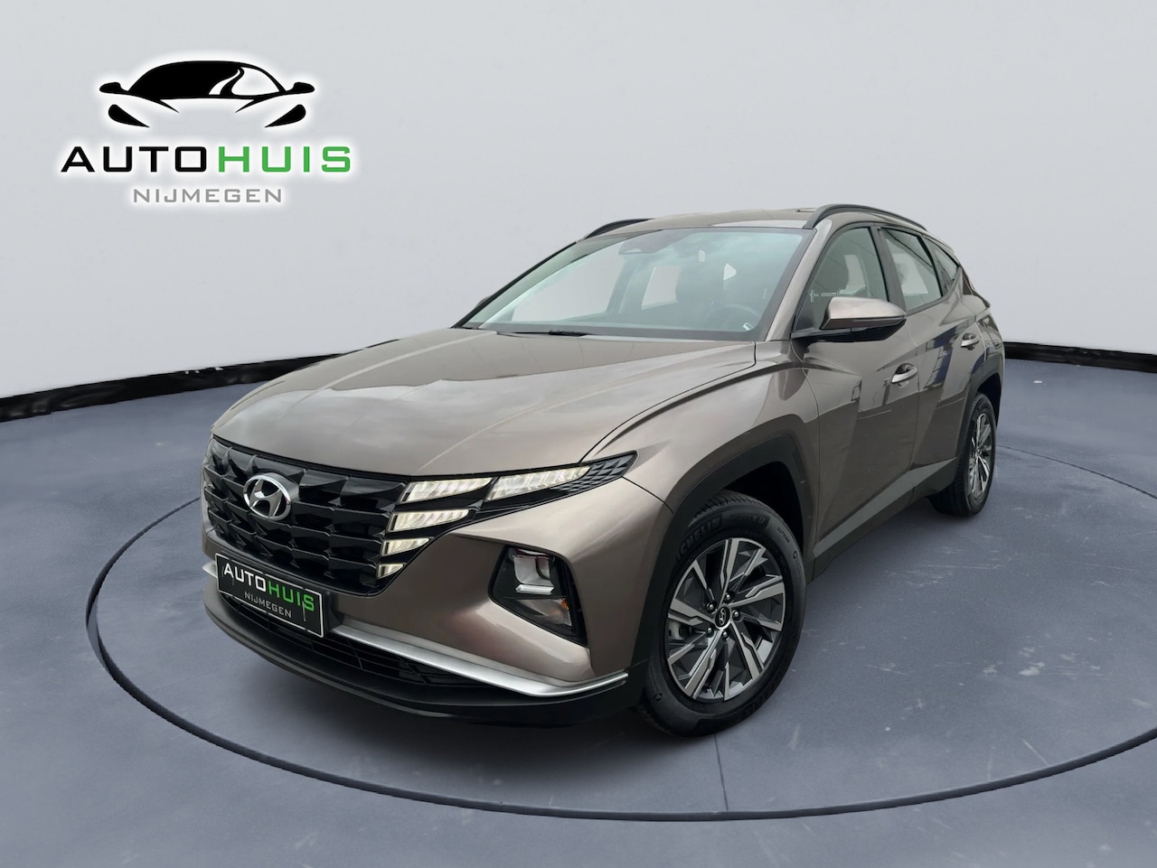 Hyundai Tucson - 1.6 T-GDI HEV i-Motion Automaat Navigatiesysteem Achteruitrijcamera - AutoWereld.nl