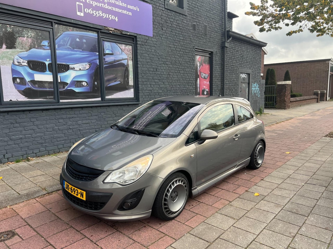 Opel Corsa - 1.4-16V Cosmo leder navi boekjes - AutoWereld.nl