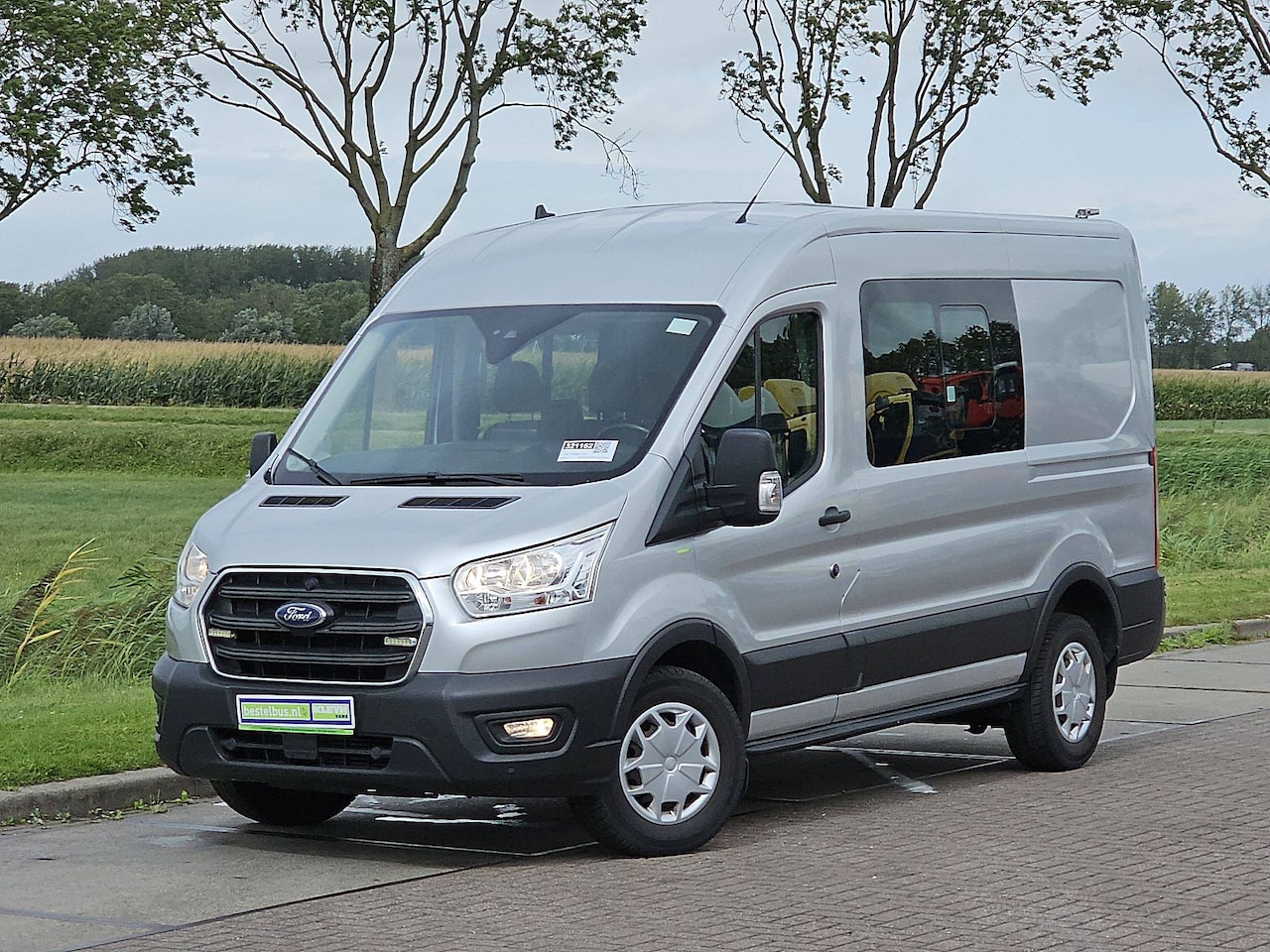 Ford Transit - 350 2.0 TDCI L2H2 DC Trend Leer Cruise Trekhaak Carplay - AutoWereld.nl