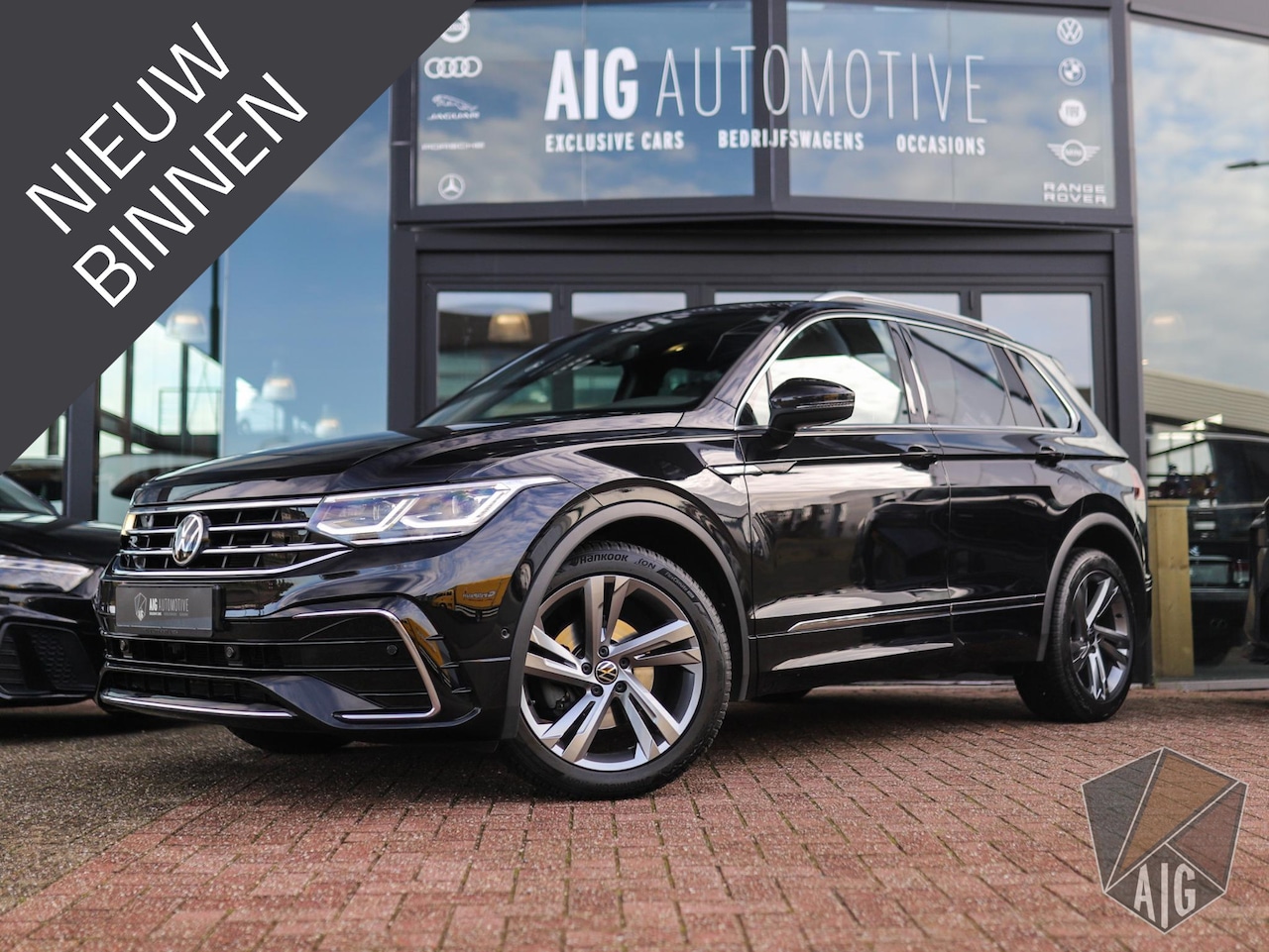 Volkswagen Tiguan - 1.5 TSI R-Line Business+ | Pano | Keyless | IQ Light | Trekhaak | Stuur/Stoelverw. - AutoWereld.nl