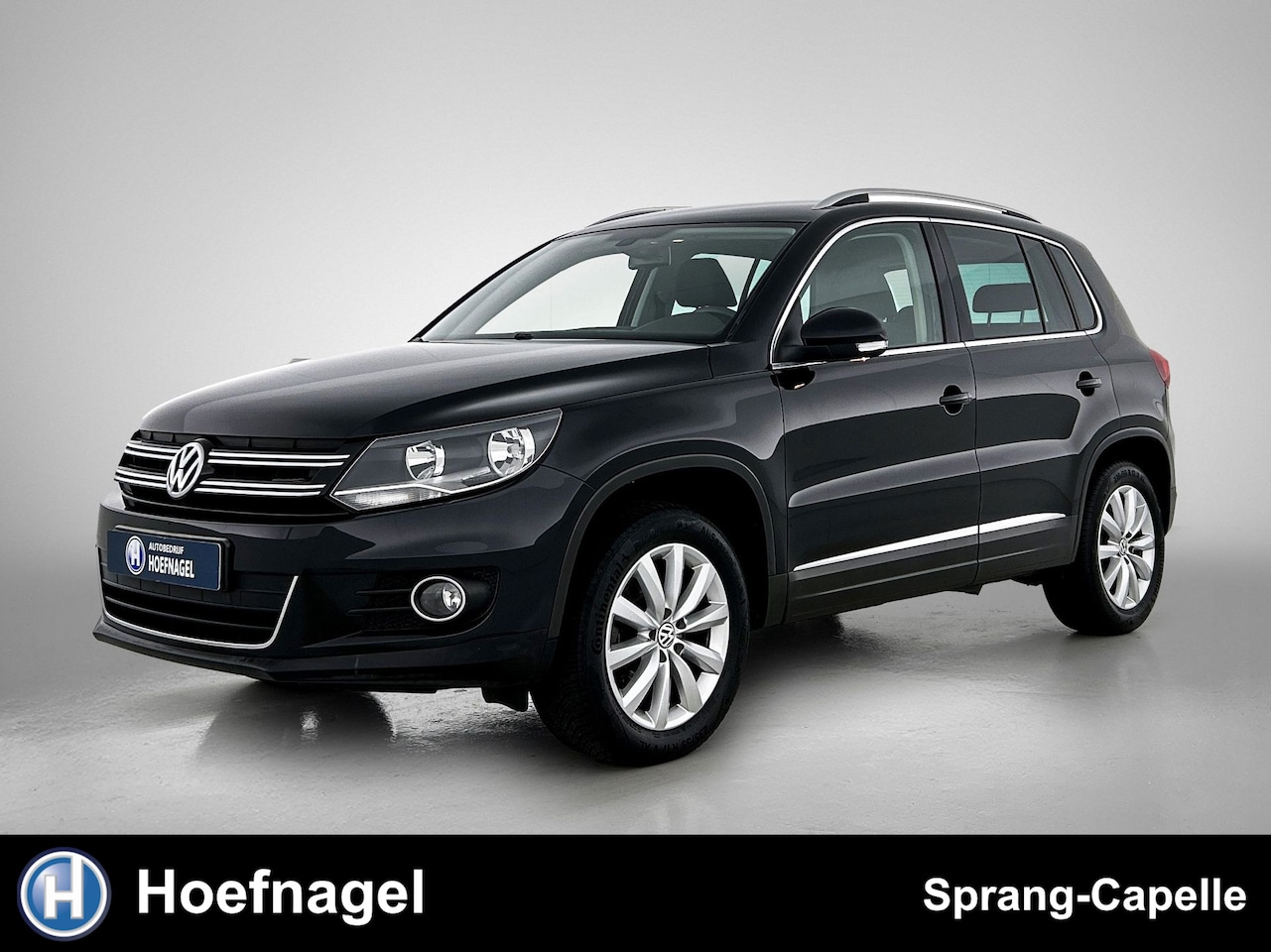 Volkswagen Tiguan - 1.4 TSI Sport&Style | Trekhaak | Climate Control | Cruise Control - AutoWereld.nl