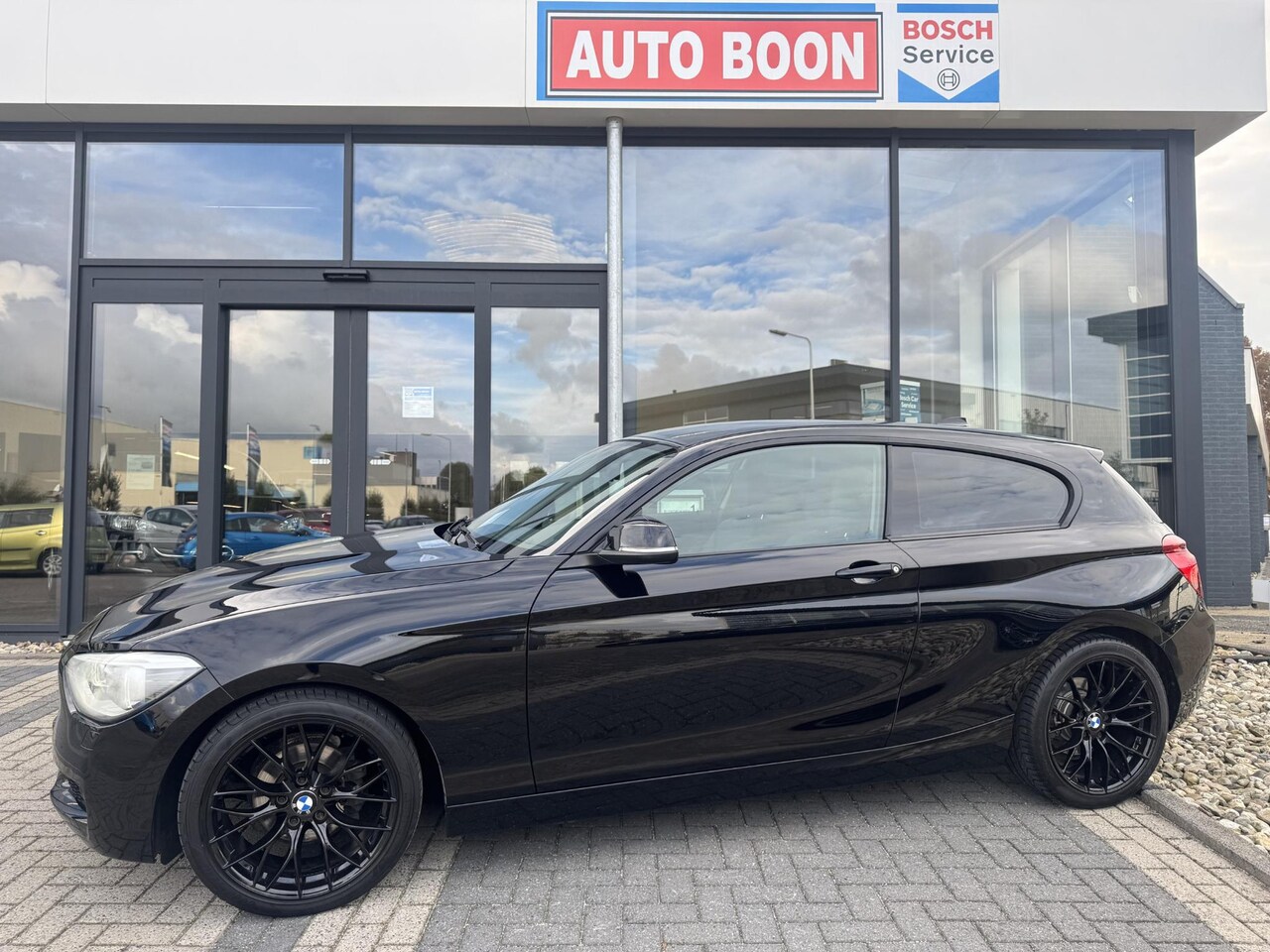 BMW 1-serie - 114i FULL OPTION : LEER/NAVI/PDC/S&S/MEDIA/ BTA/18INCH.LMV/ - NL AUTO/KM=NAP - AutoWereld.nl
