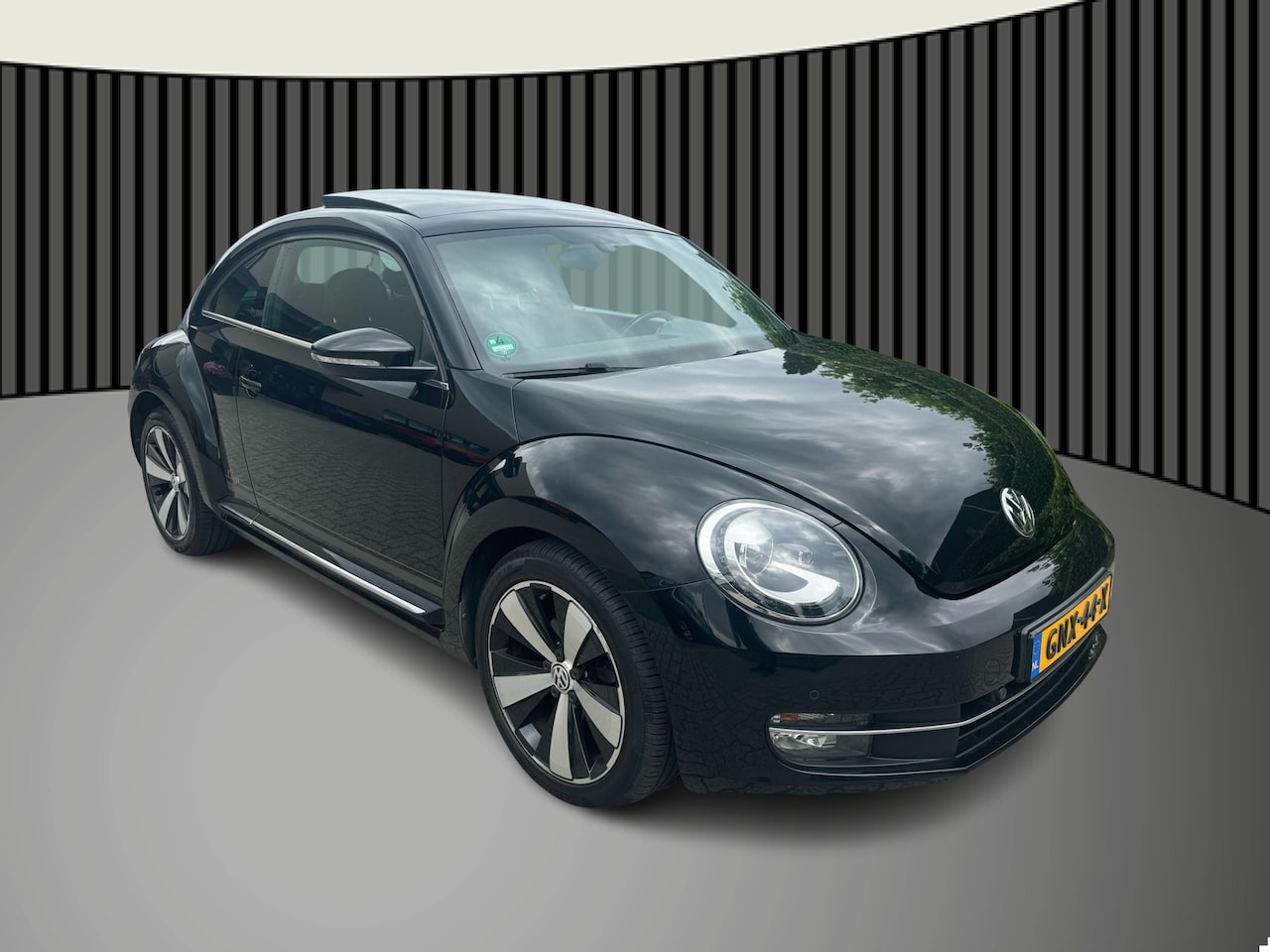 Volkswagen Beetle - 1.2 TSI Design BlueMotion xenon, pano, cruise, stoelverw - AutoWereld.nl