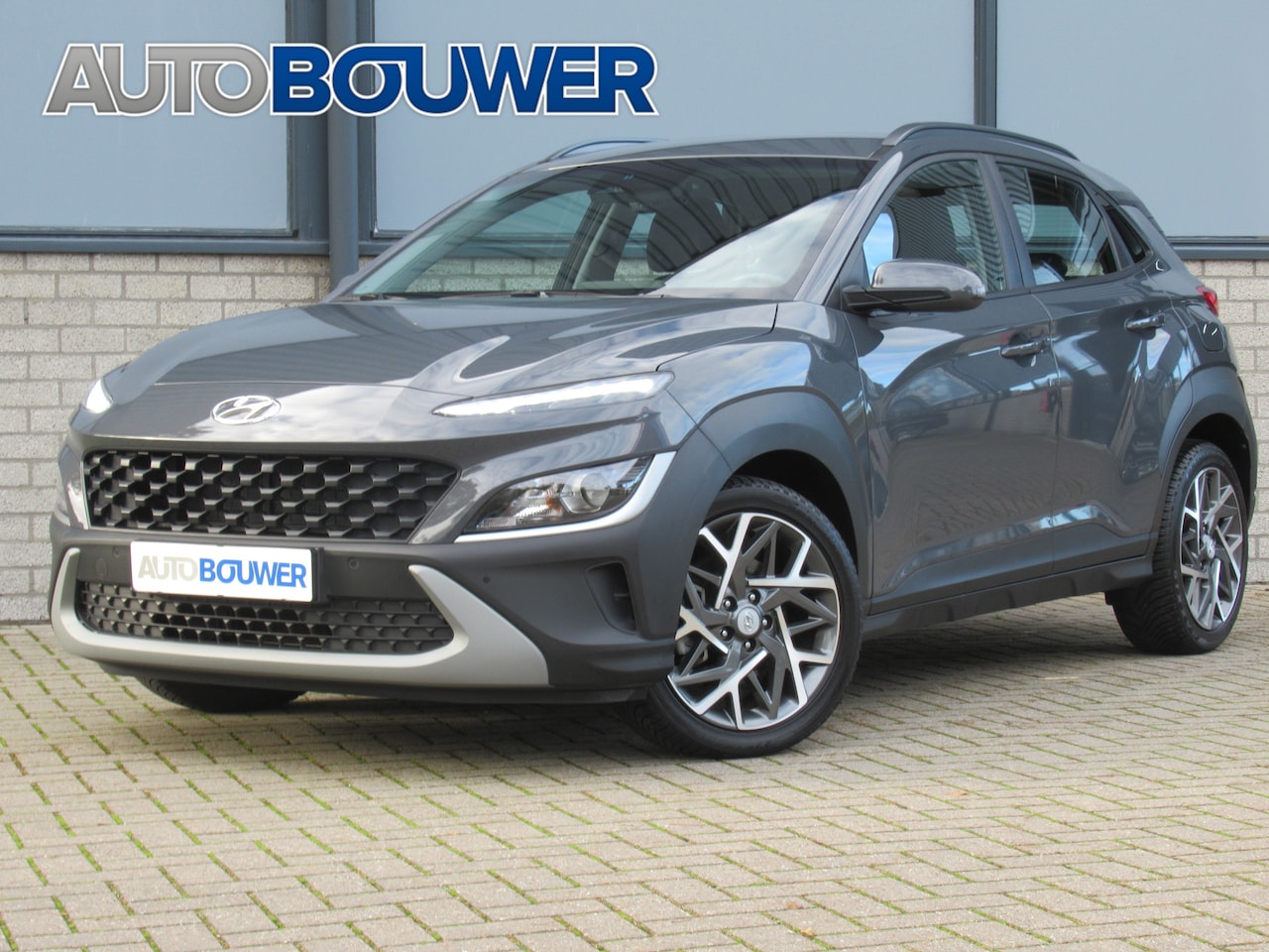 Hyundai Kona - 1.6 GDI HEV 1e eigen | dealer onderh | 18"inch | stoel + stuur verw | PDC V+A - AutoWereld.nl