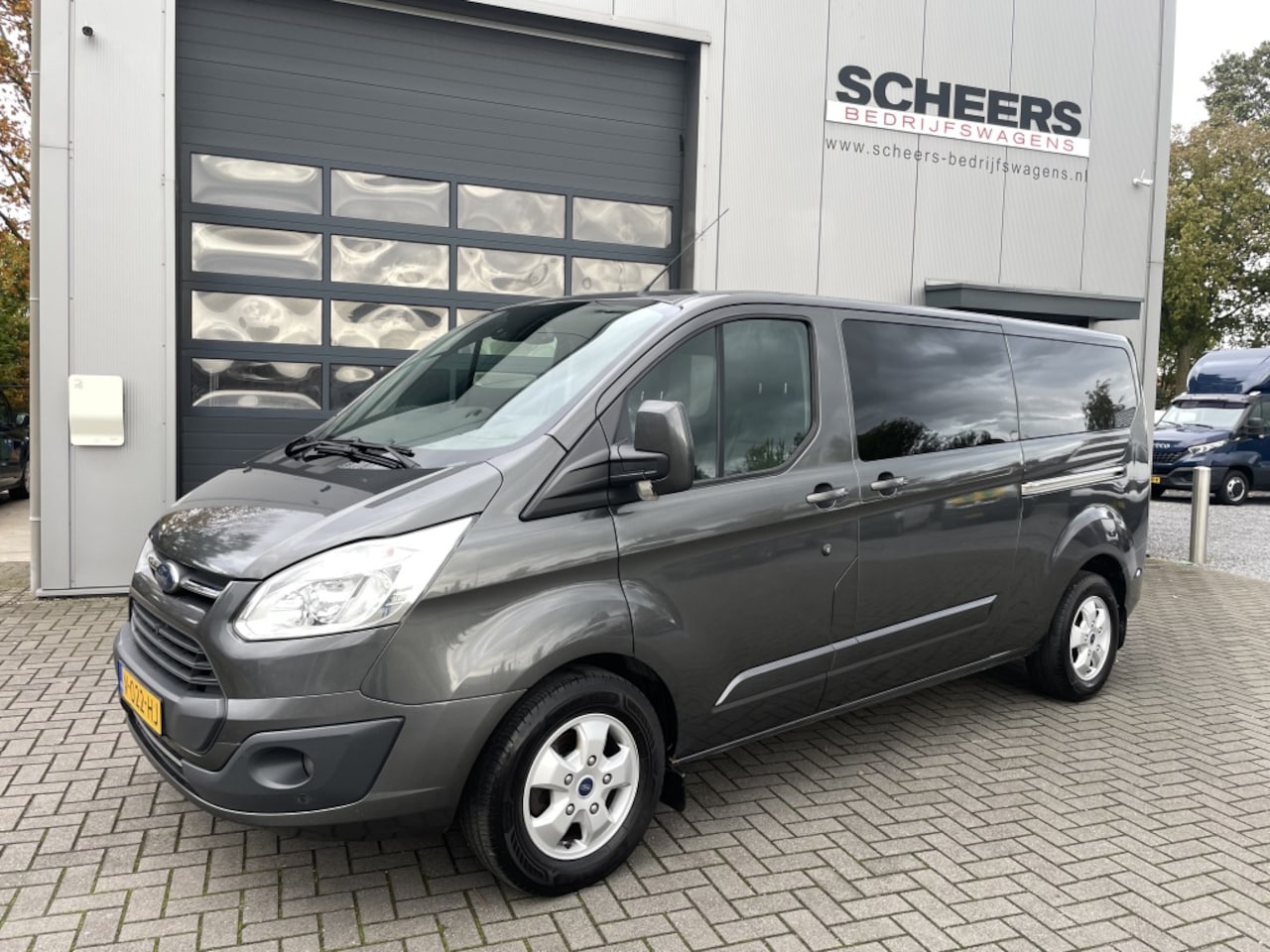Ford Transit Custom - 2.0 TDCI 130PK L2 DC Limited | airco | navigatie | camera - AutoWereld.nl