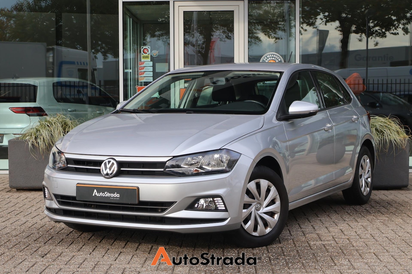 Volkswagen Polo - 1.0 Comfortline TSI 95pk | Adaptive | Navigatie | Airco | Carplay | DAB Radio - AutoWereld.nl