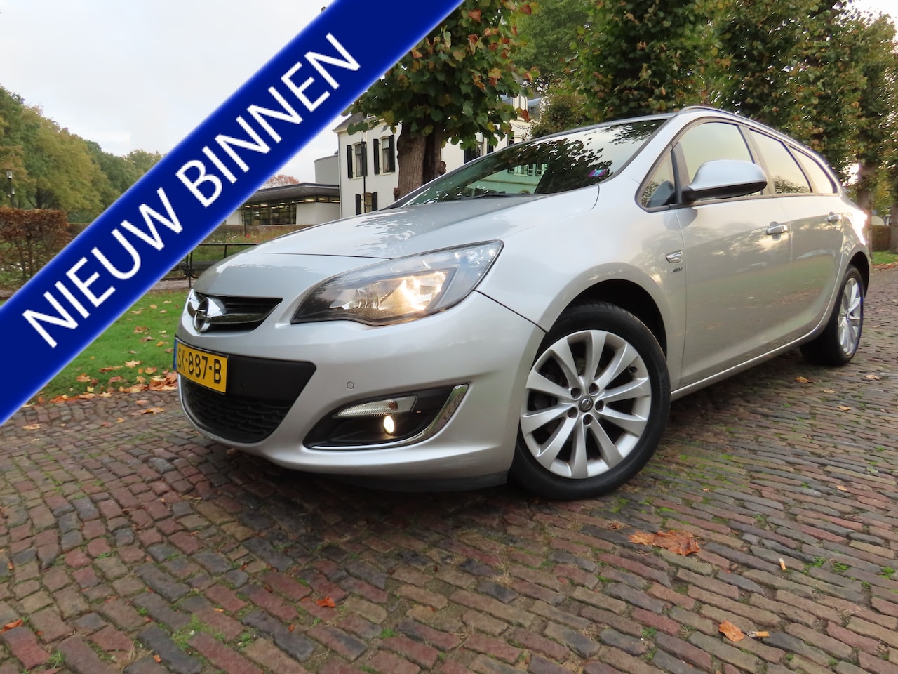 Opel Astra Sports Tourer - 1.4 Turbo Cosmo Cruise Stoelverwarming Stuurverwarming Ecc Navi Bleutooth Trekhaak Pdc Lm - AutoWereld.nl