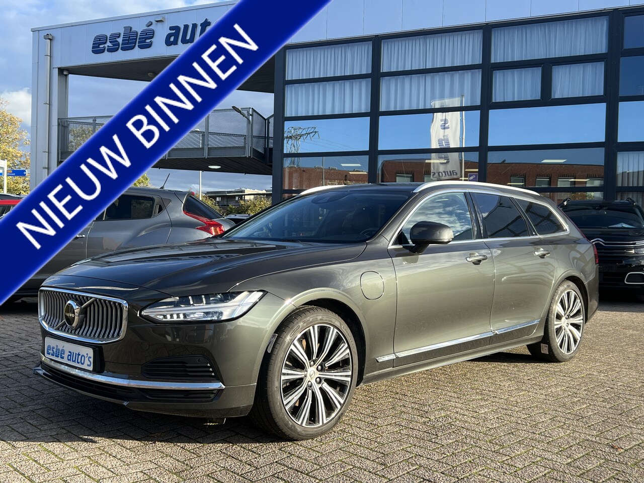 Volvo V90 - 2.0 T6 Recharge AWD Inscription Trekhaak Camera Parkeersensoren Navi Leer Stoelverwarming - AutoWereld.nl