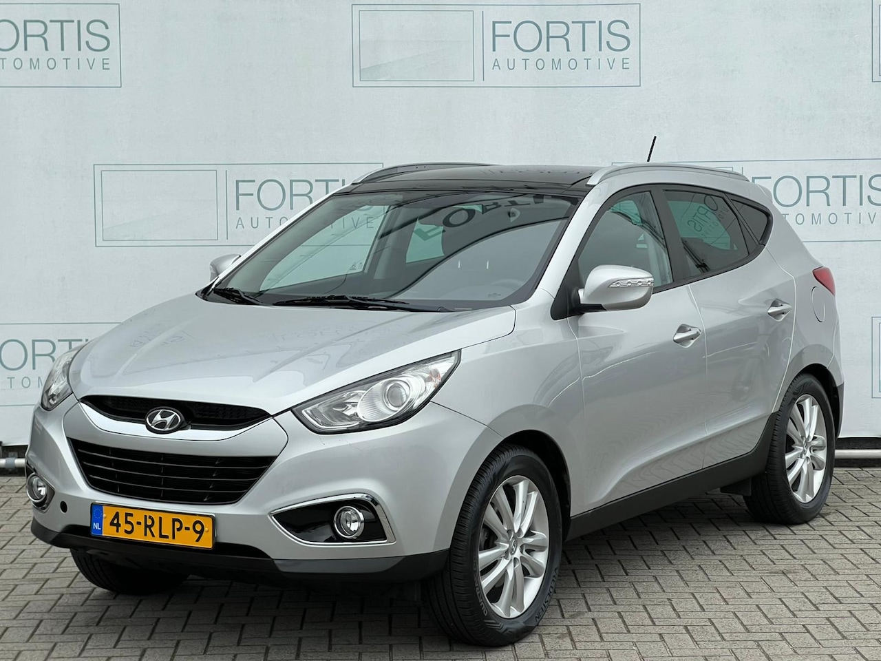 Hyundai ix35 - 2.0i 4WD i-Catcher PANDODAK | ECC | LEDER - AutoWereld.nl