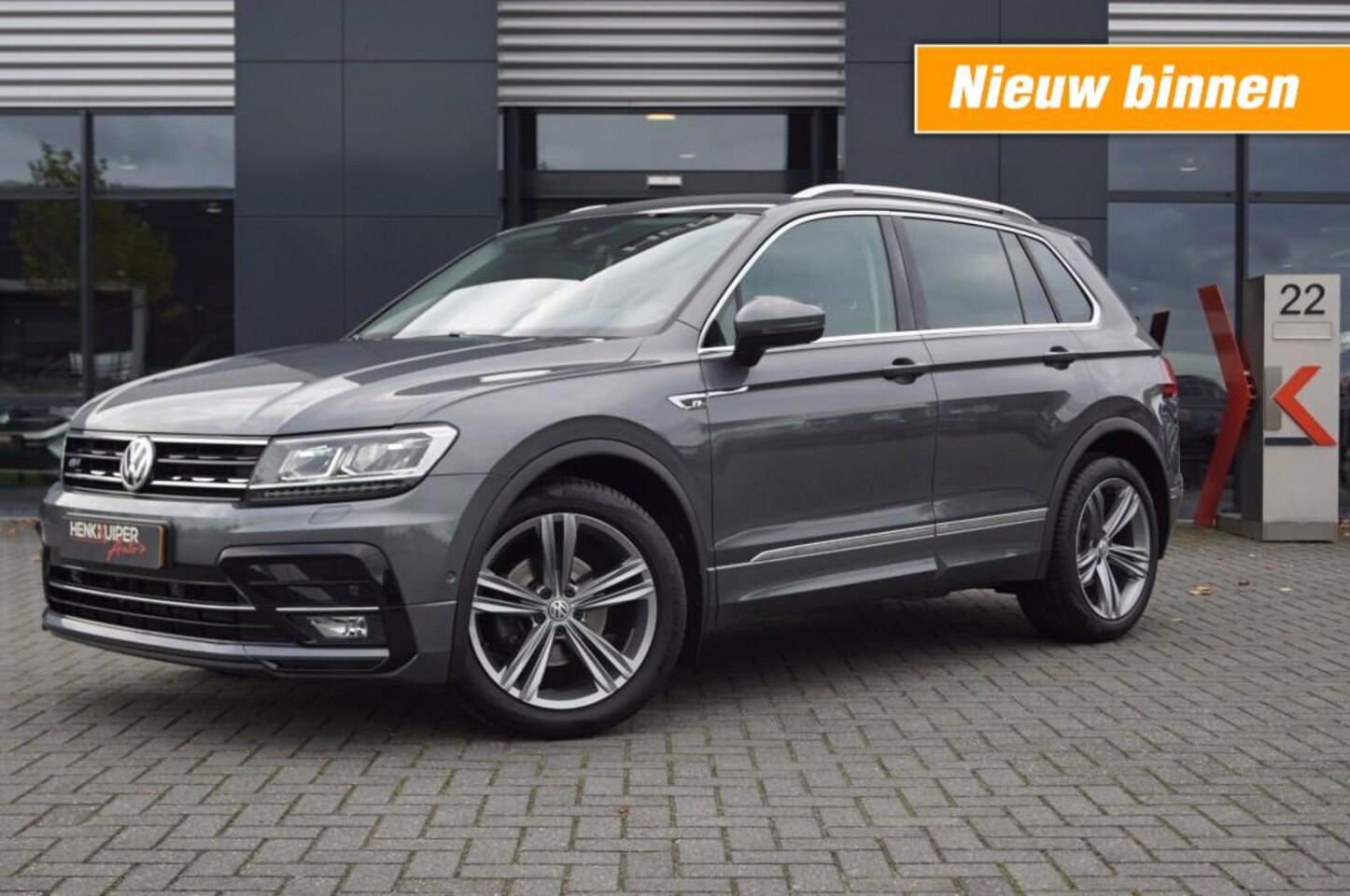 Volkswagen Tiguan - 1.5 TSI DSG R-line 150pk / Navi / Camera / Trekhaak wegkl.b./ Park-assist / ACC - AutoWereld.nl