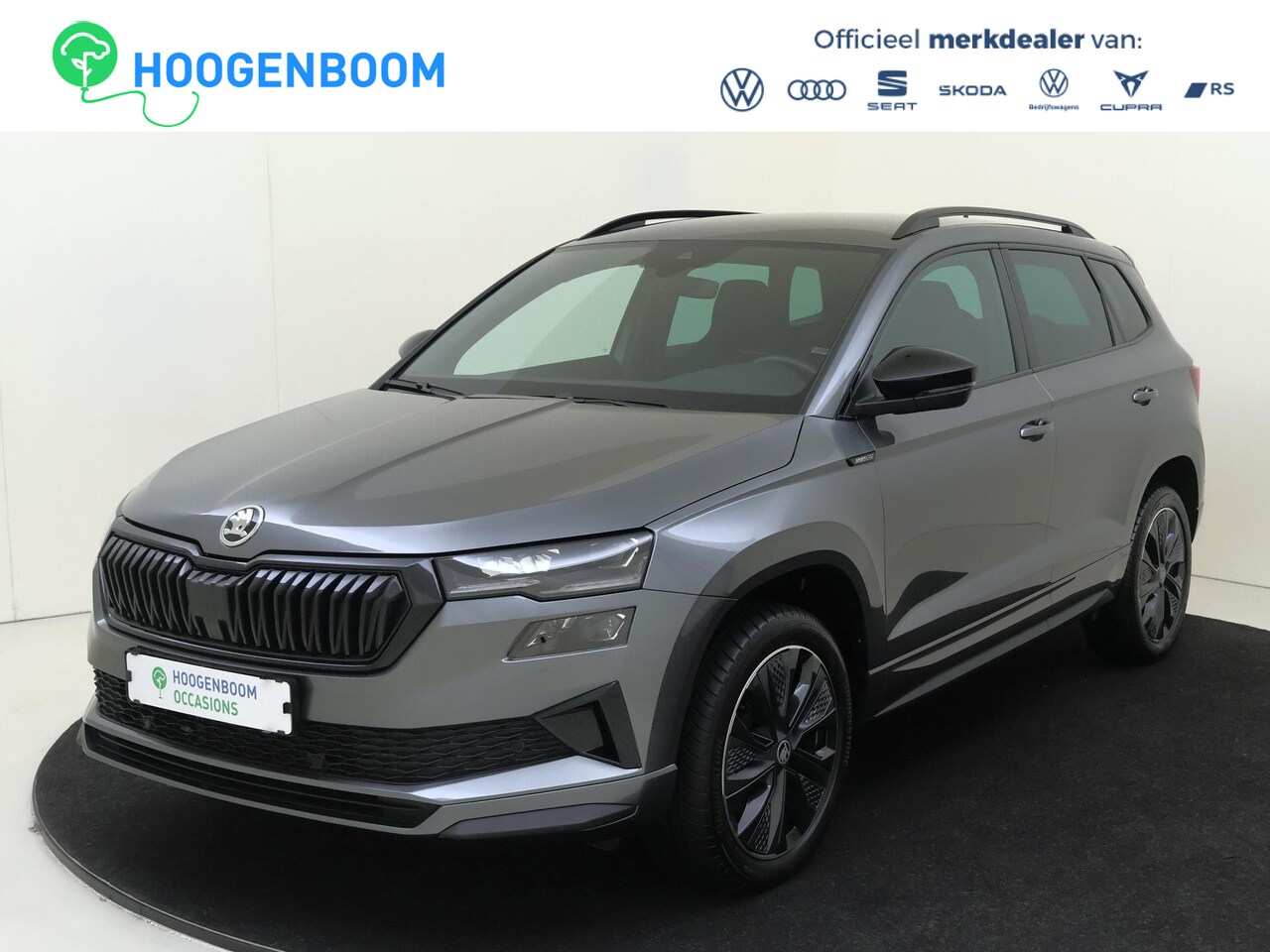Skoda Karoq - 1.5 TSI ACT Sportline Business | Trekhaak | Achteruitrijcamera | Keyless | Adaptieve cruis - AutoWereld.nl