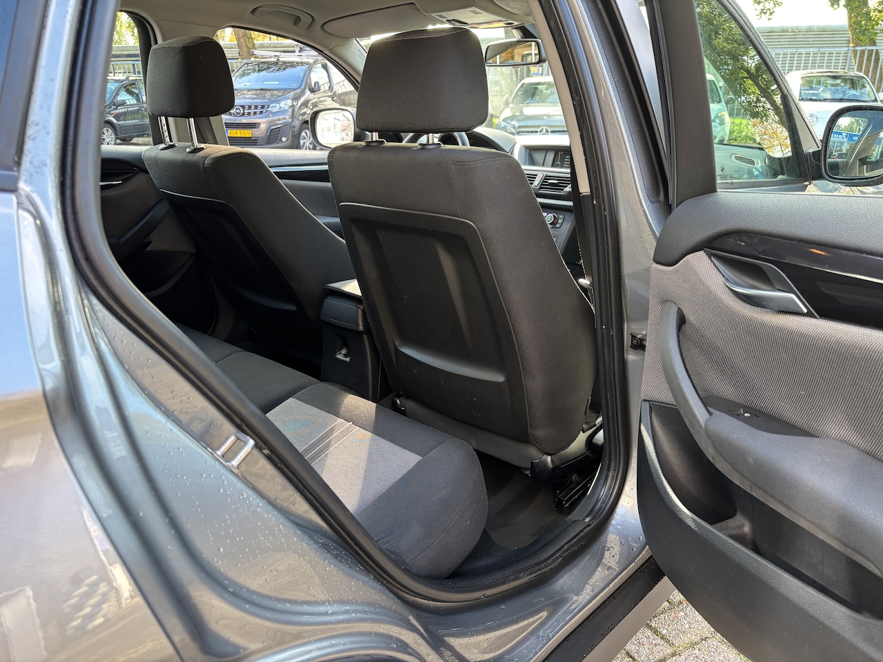 BMW X1 - 1.8i sDrive Executive | Org-NL auto. Xenon. Sportstoelen. Navi.