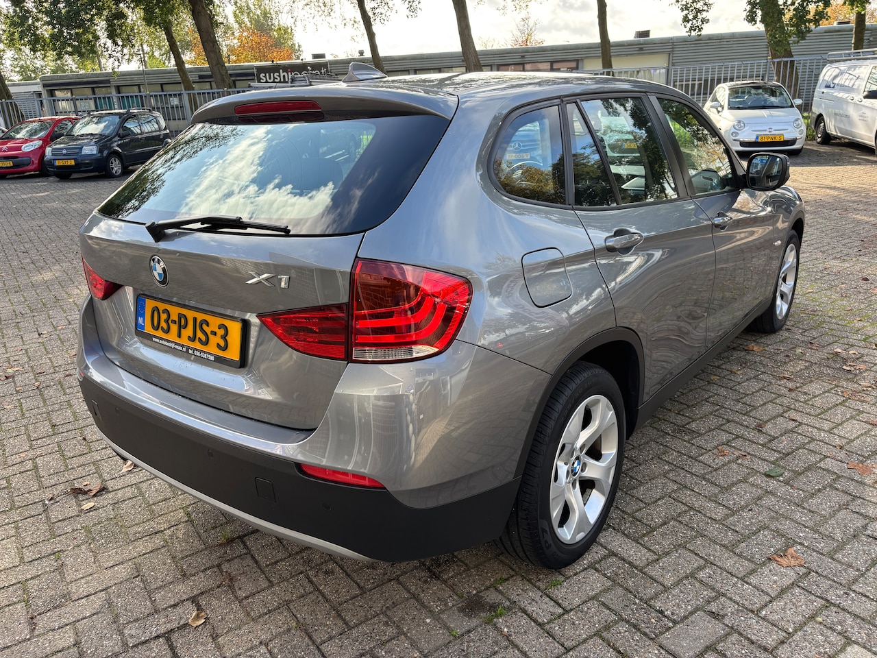BMW X1 - 1.8i sDrive Executive | Org-NL auto. Xenon. Sportstoelen. Navi.