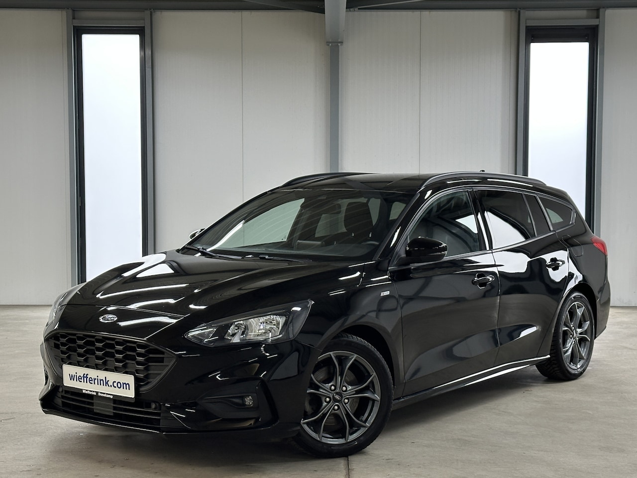 Ford Focus Wagon - 1.5 EcoBoost ST-Line Business 150 pk | winterpakker | - AutoWereld.nl