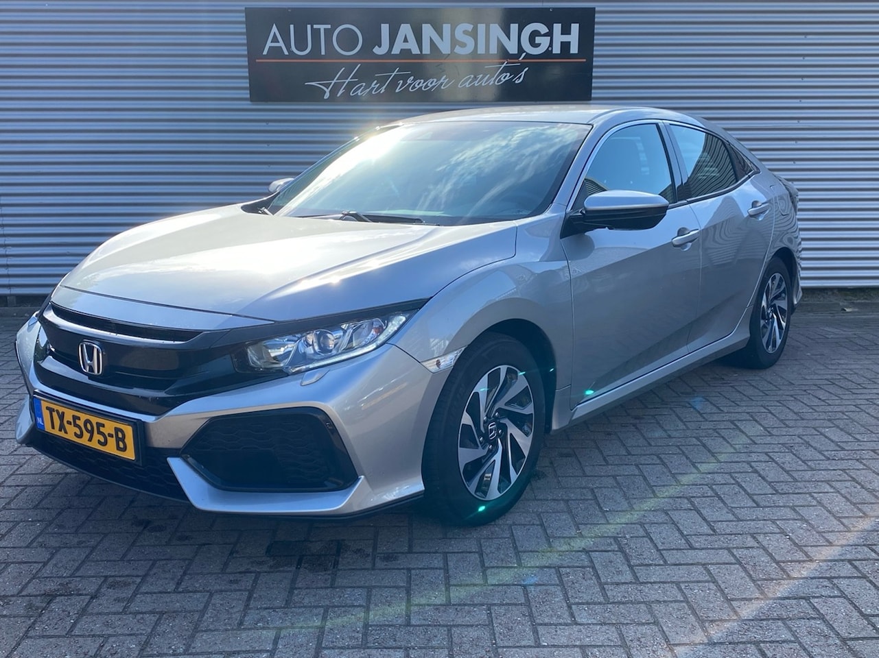 Honda Civic - 1.0 i-VTEC 147Pk!! | ACC | Climate | Navigatie | Bluetooth | Stoelverwarming | RIJKLAARPRI - AutoWereld.nl