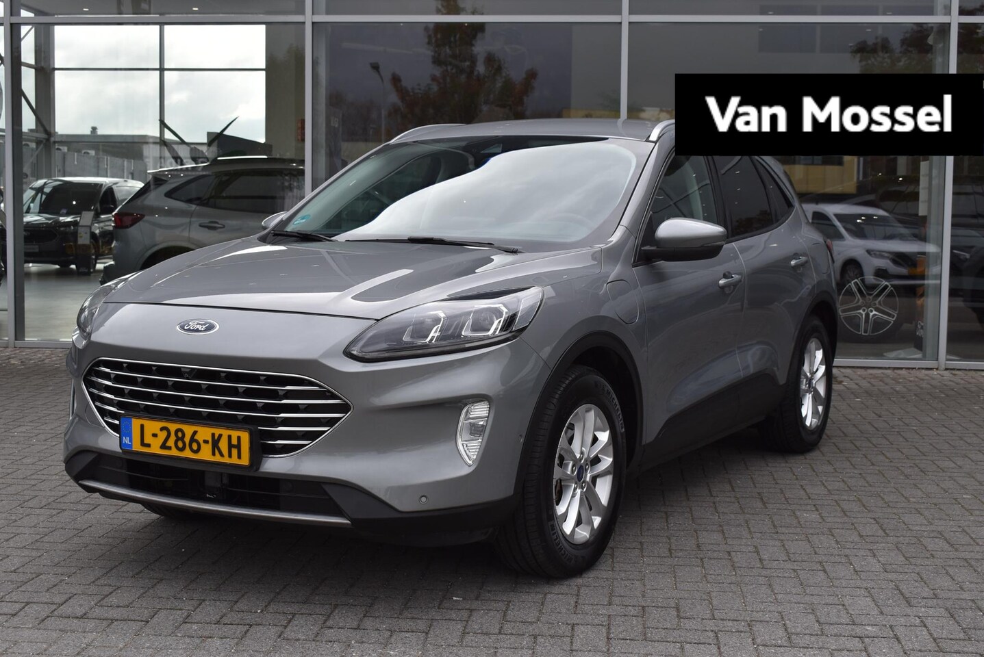 Ford Kuga - 2.5 PHEV Titanium X Climate Control | Adaptieve Cruise Control | Winterpakket | Achteruitr - AutoWereld.nl