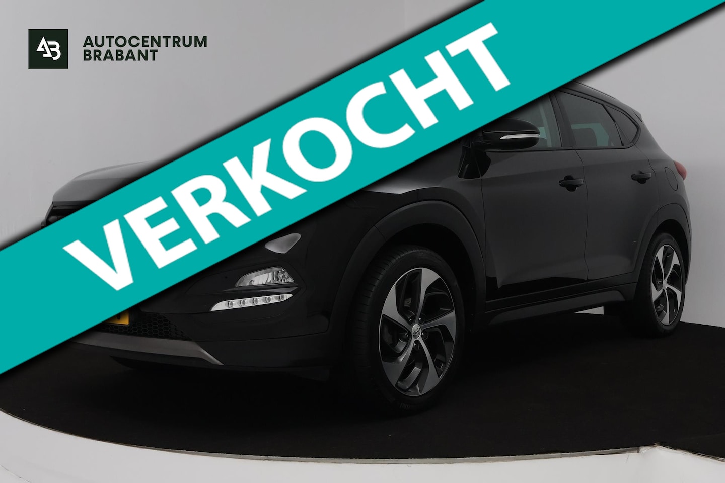 Hyundai Tucson - 1.6 GDi Comfort (STOELVERWARMING, TREKHAAK AFNEEMBAAR, CAMERA, STUURBEDIENING, NAVIGATIE) - AutoWereld.nl