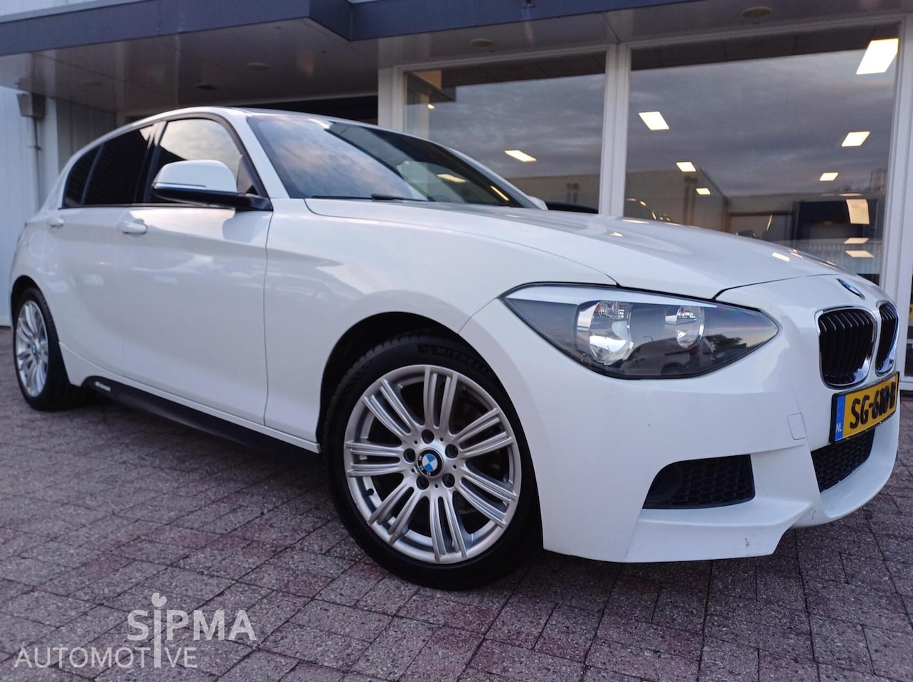 BMW 1-serie - 116i M Sport High Executive 116i M-sport High Executive - AutoWereld.nl