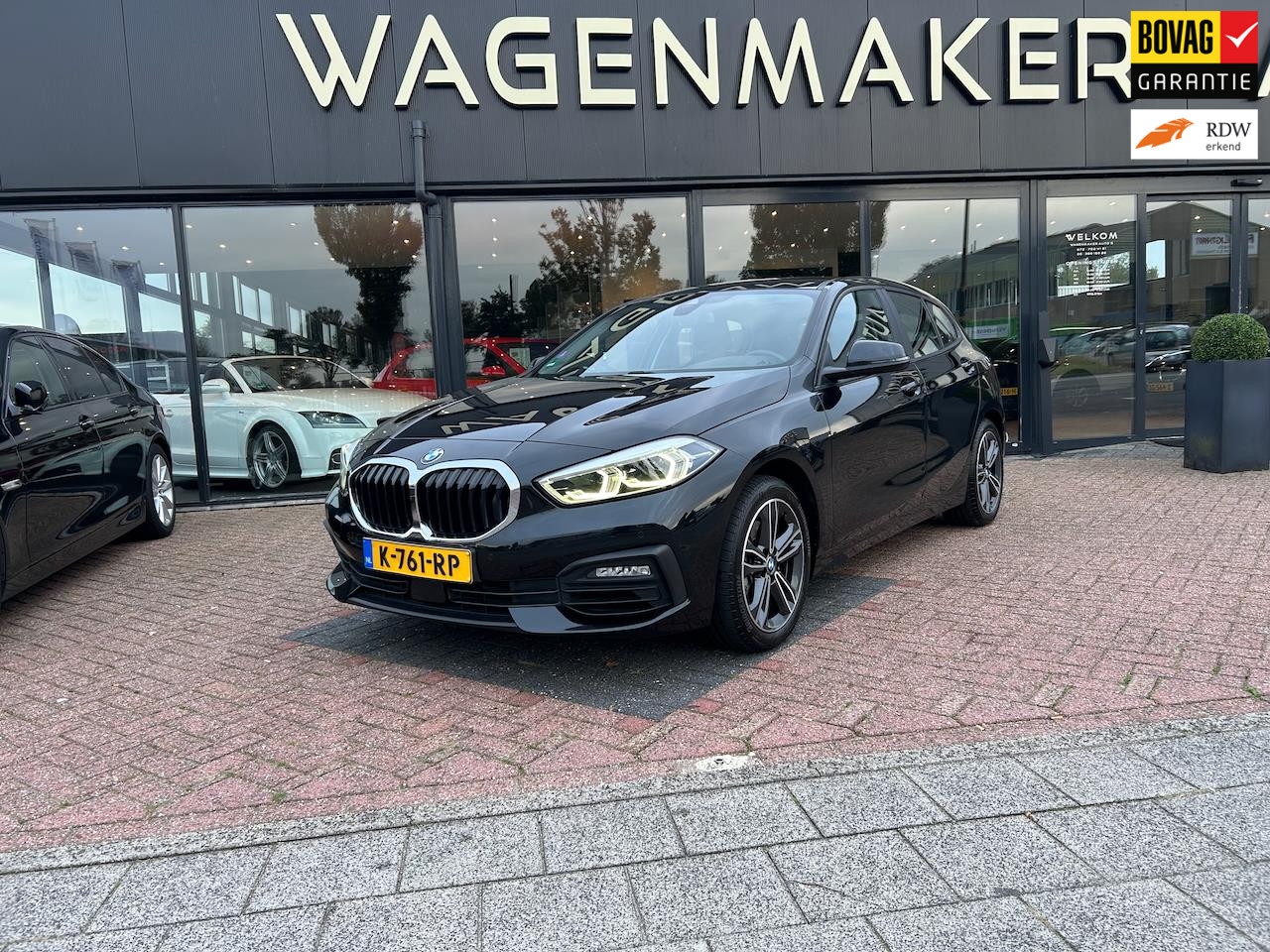 BMW 1-serie - 118i High Executive AUT|Clima|Cruise|NAVI|Carplay - AutoWereld.nl
