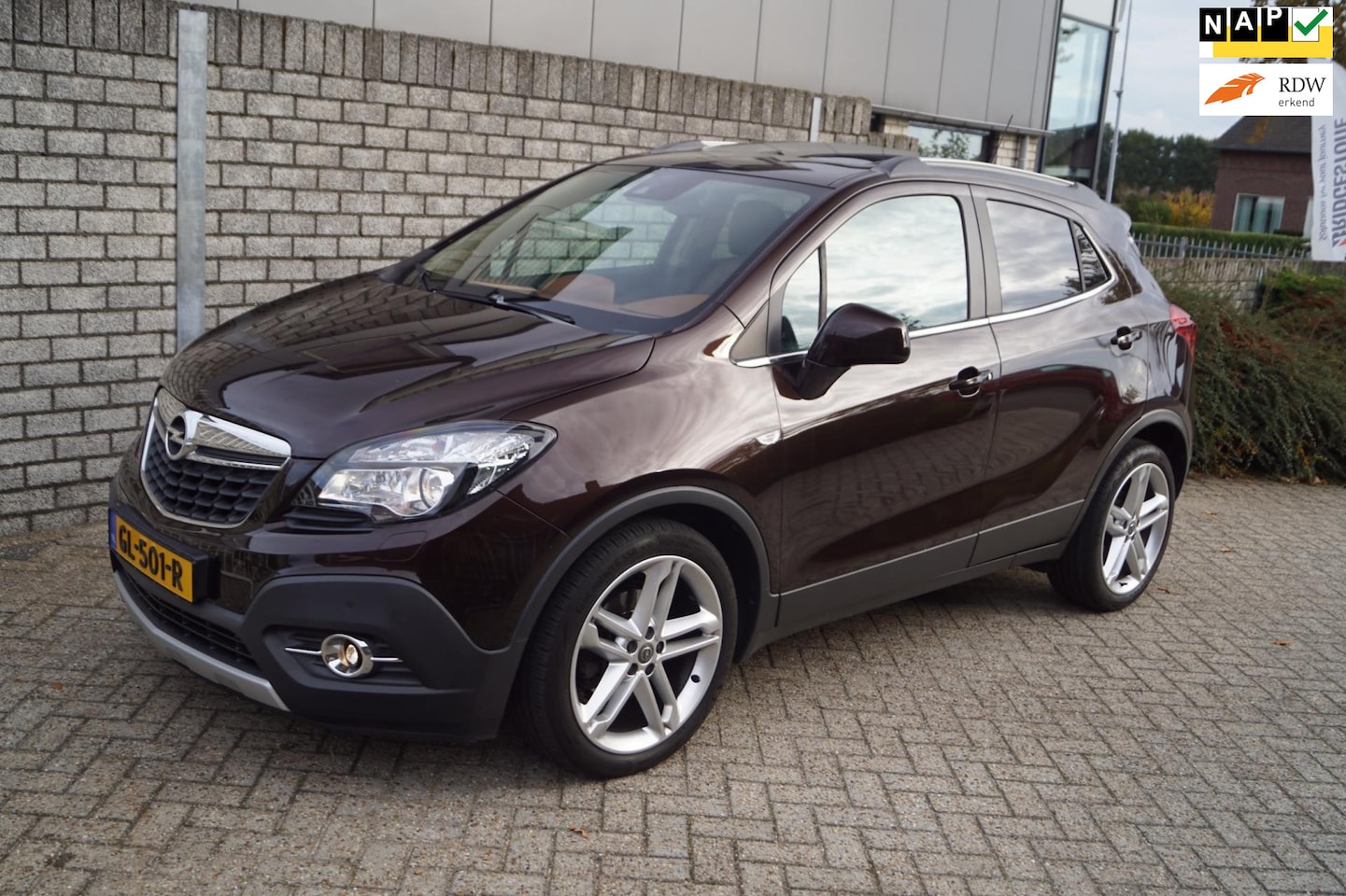 Opel Mokka - 1.4 T Cosmo Leder Sportst Stoel/Stuurverw Navi Camera Xenon Schkdak Clima Cruise 2x PDC LM - AutoWereld.nl