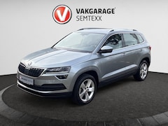 Skoda Karoq - 1.0 TSI Ambition Business | Automaat | Clima | Cruise | Dakrails | Half Leder | Stoelverw.