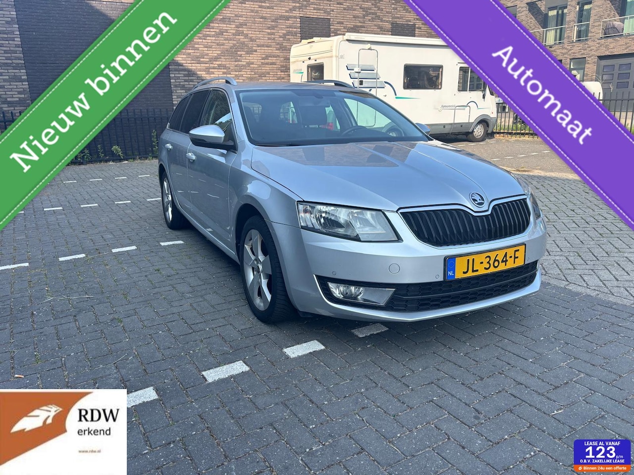 Skoda Octavia Combi - 1.6 TDI DSG Elegance Businessline - AutoWereld.nl