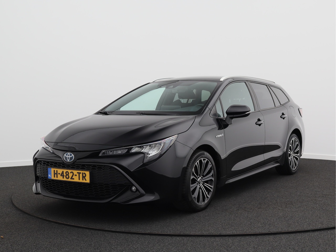 Toyota Corolla Touring Sports - 1.8 Hybrid Business Plus/ lage km/ zeer mooi! - AutoWereld.nl
