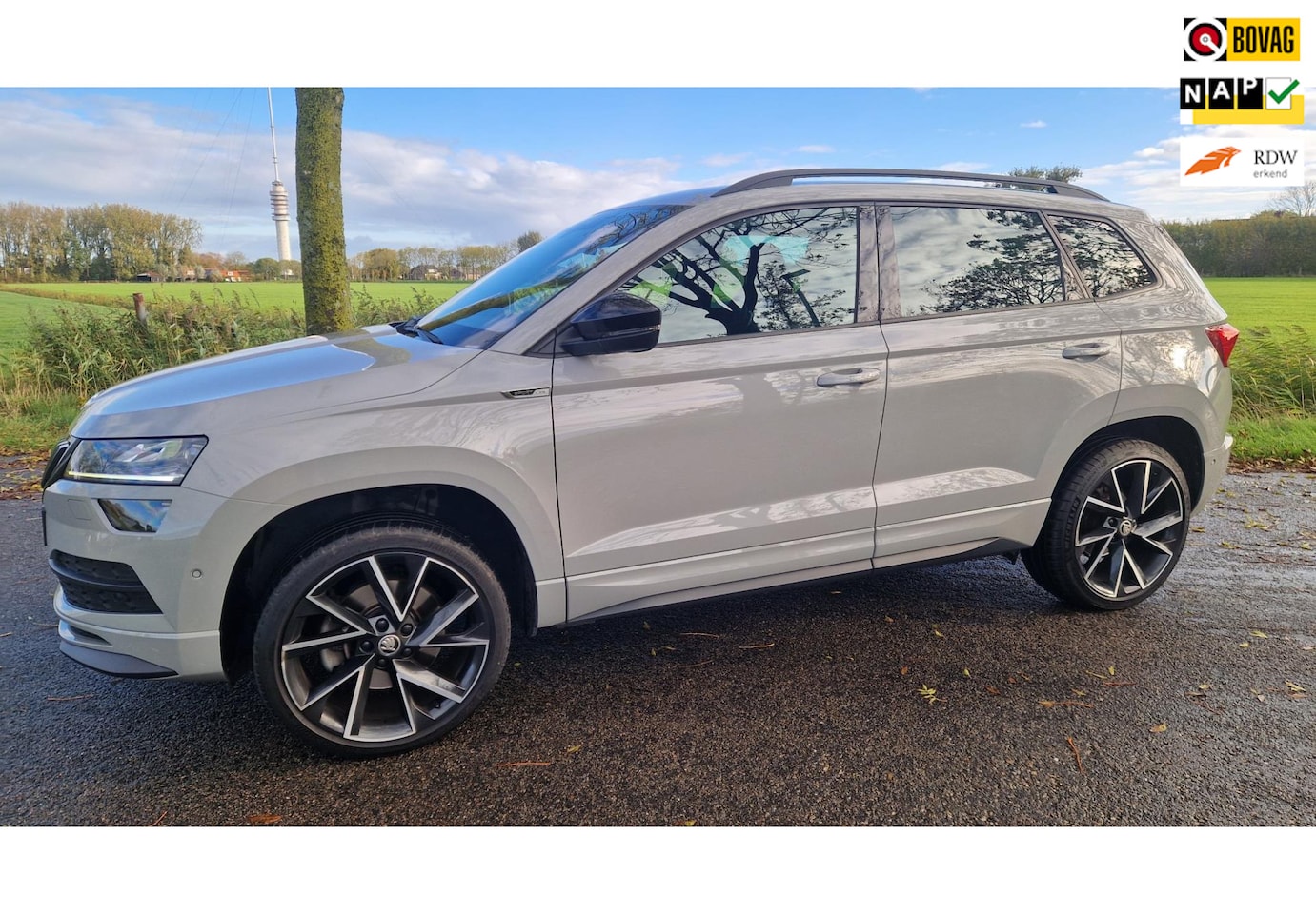 Skoda Karoq - 1.5 TSI ACT Sportline Business 1.5 TSI ACT Sportline Business, 1e eig, camera - AutoWereld.nl