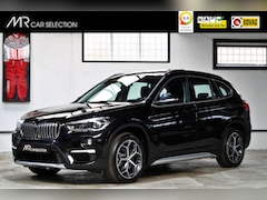 BMW X1 - sDrive20i Orange Edition III | Panoramadak | Leder | Head-Up | Trekhaak | NL auto|