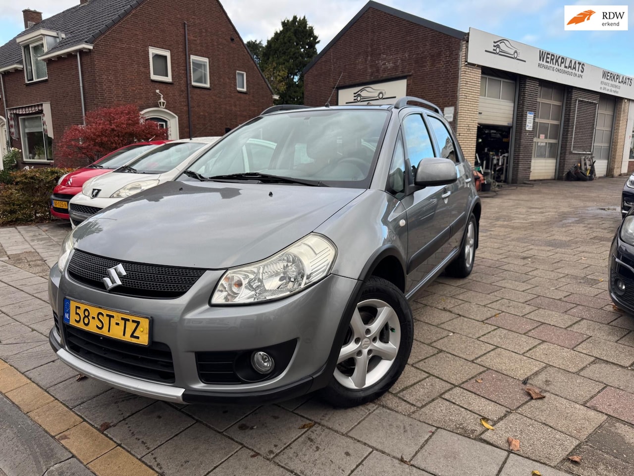 Suzuki SX4 - 1.6 4Grip Exclusive 4X4 AIIRCO/KEYLESS/ TREKHAAK - AutoWereld.nl