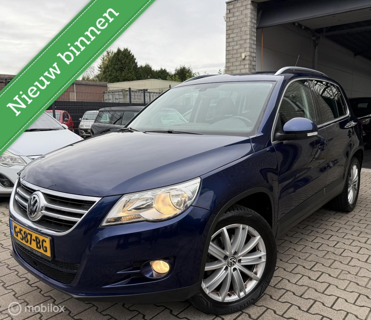 Volkswagen Tiguan - 2.0 TSI Comfort&Design 4Motion / 127.000KM - AutoWereld.nl