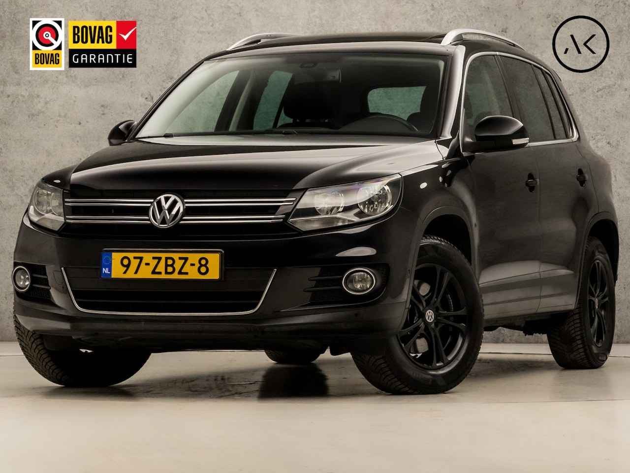 Volkswagen Tiguan - 1.4 TSI Black Sport 161Pk (PANORAMADAK, NAVIGATIE, CLIMATE, KEYLESS, LEDEREN SPORTSTOELEN, - AutoWereld.nl