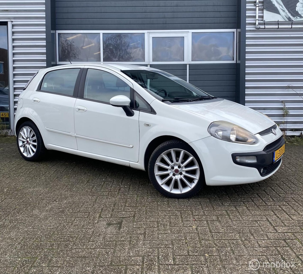 Fiat Punto Evo - 1.4-16V Multiair 2010 106PK|Bluetooth|17 Inch - AutoWereld.nl