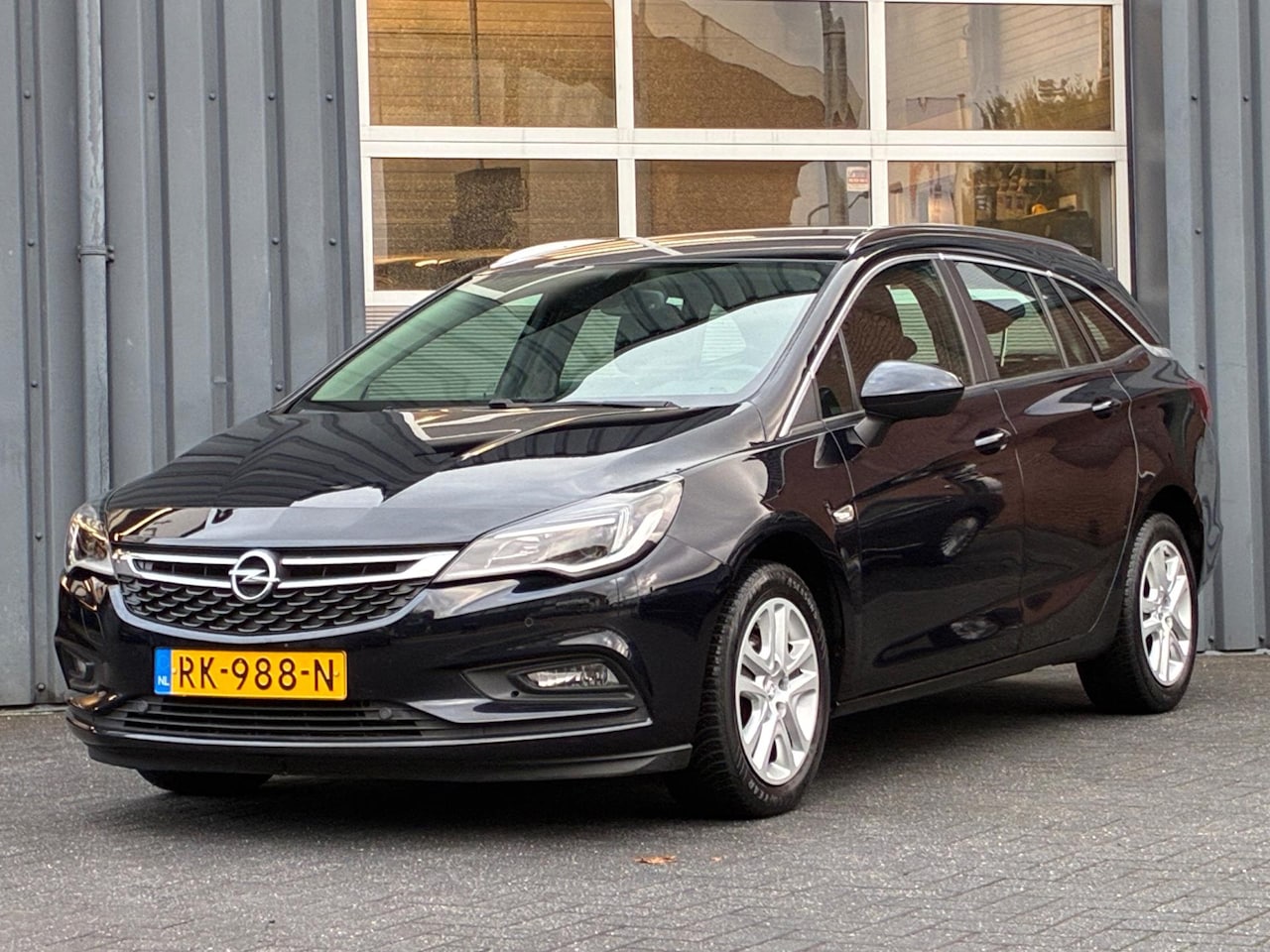 Opel Astra Sports Tourer - 1.4 Online Edition Climate controle Navigatie Pdc - AutoWereld.nl