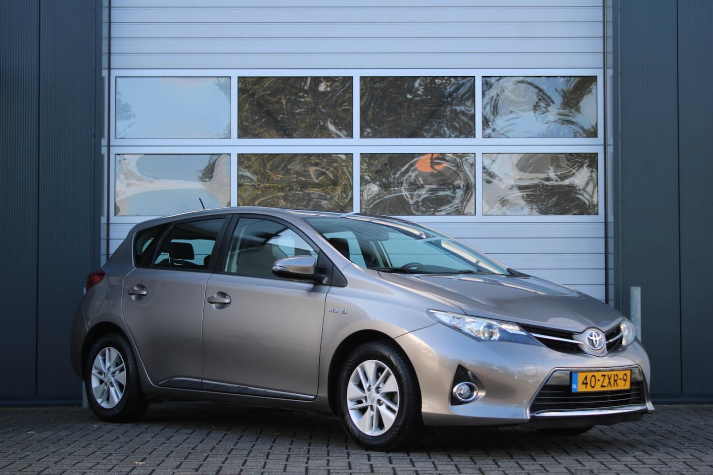 Toyota Auris - 1.8 Hybrid Aspiration Clima/Cruise/Camera/Navi/Bluetooth/PDC/LED/RadioCD/15"LM/Dealeronder - AutoWereld.nl