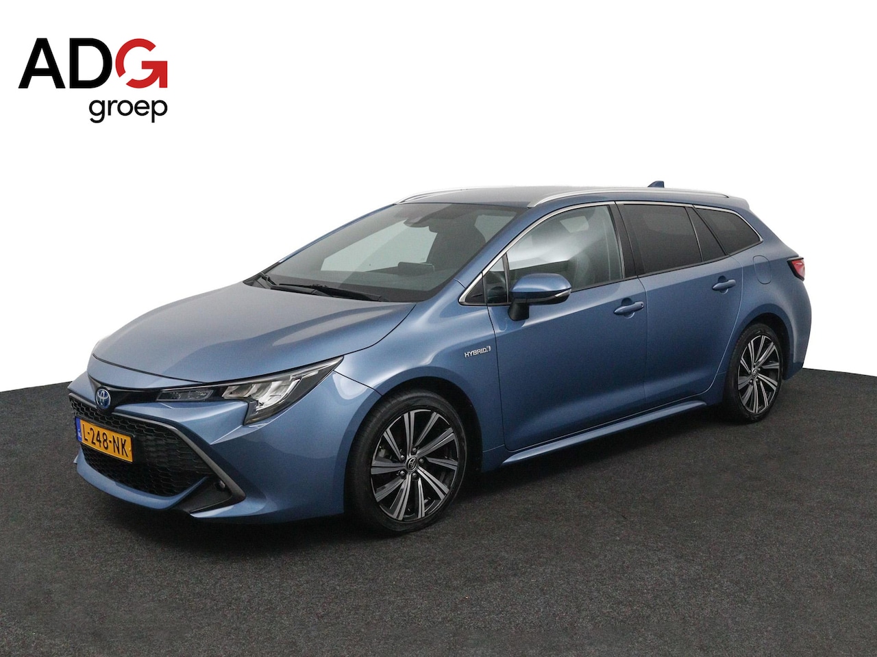 Toyota Corolla Touring Sports - 1.8 Hybrid Dynamic | Trekhaak | Stoelverwarming | Draadloos telefoonlader | Keyless Entry - AutoWereld.nl