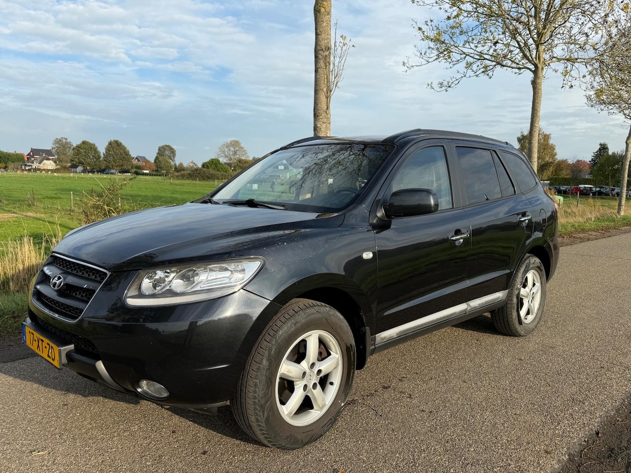 Hyundai Santa Fe - 2.2 CRDi Style 7p./Leder/Cruise/Groot scherm - AutoWereld.nl