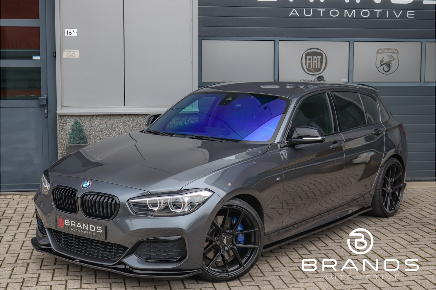 BMW 1-serie - M140i High Executive 340PK Maxton Milltek Zeer luxe - AutoWereld.nl