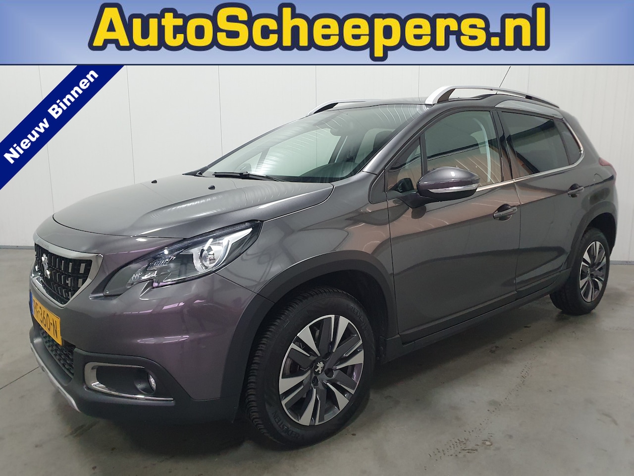 Peugeot 2008 - 1.2 PureTech Allure PANO/NAVI/PDC/CRUISE/LMV - AutoWereld.nl
