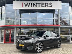 BMW iX - xDrive40 Executive 77 kWh | Head-Up Display | Camera | Stoelverwarming | Navigatie |