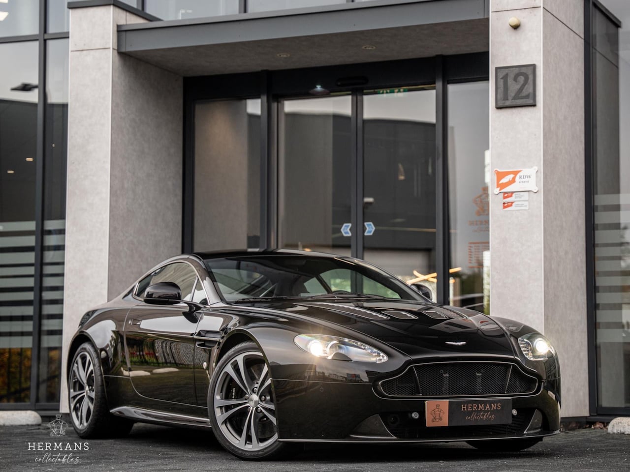 Aston Martin V12 Vantage - 5.9 / Manual / Carbon / Active / Memory - AutoWereld.nl