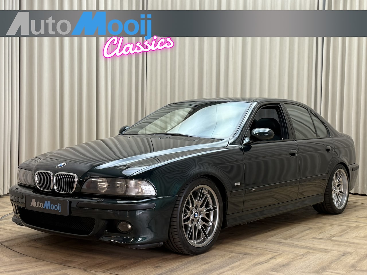 BMW M5 - 5-serie E39 / Oxford Grün / 400 PK / S62 5.0 V8 / English Grün Heritage Leder / 1999 - AutoWereld.nl