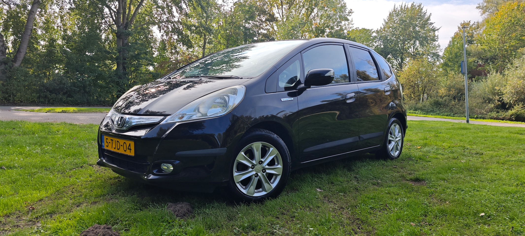 Honda Jazz - 1.4 Hybrid Elegance - AutoWereld.nl