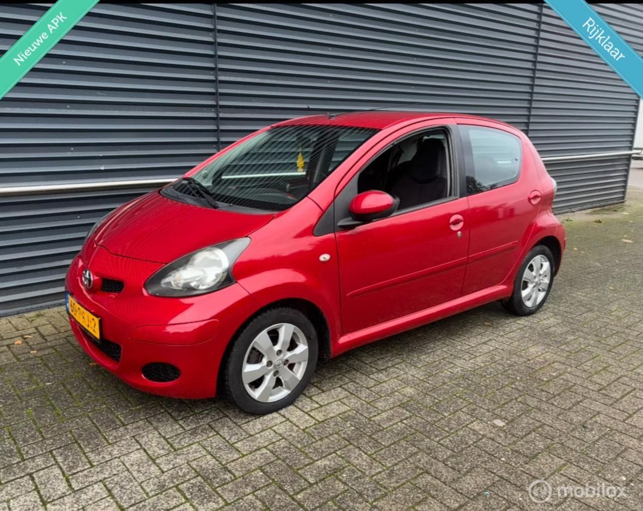 Toyota Aygo - 1.0-12V Aspiration Red |Leder|Navi|Airco|NWE APK| Luxe Uitvoeting - AutoWereld.nl