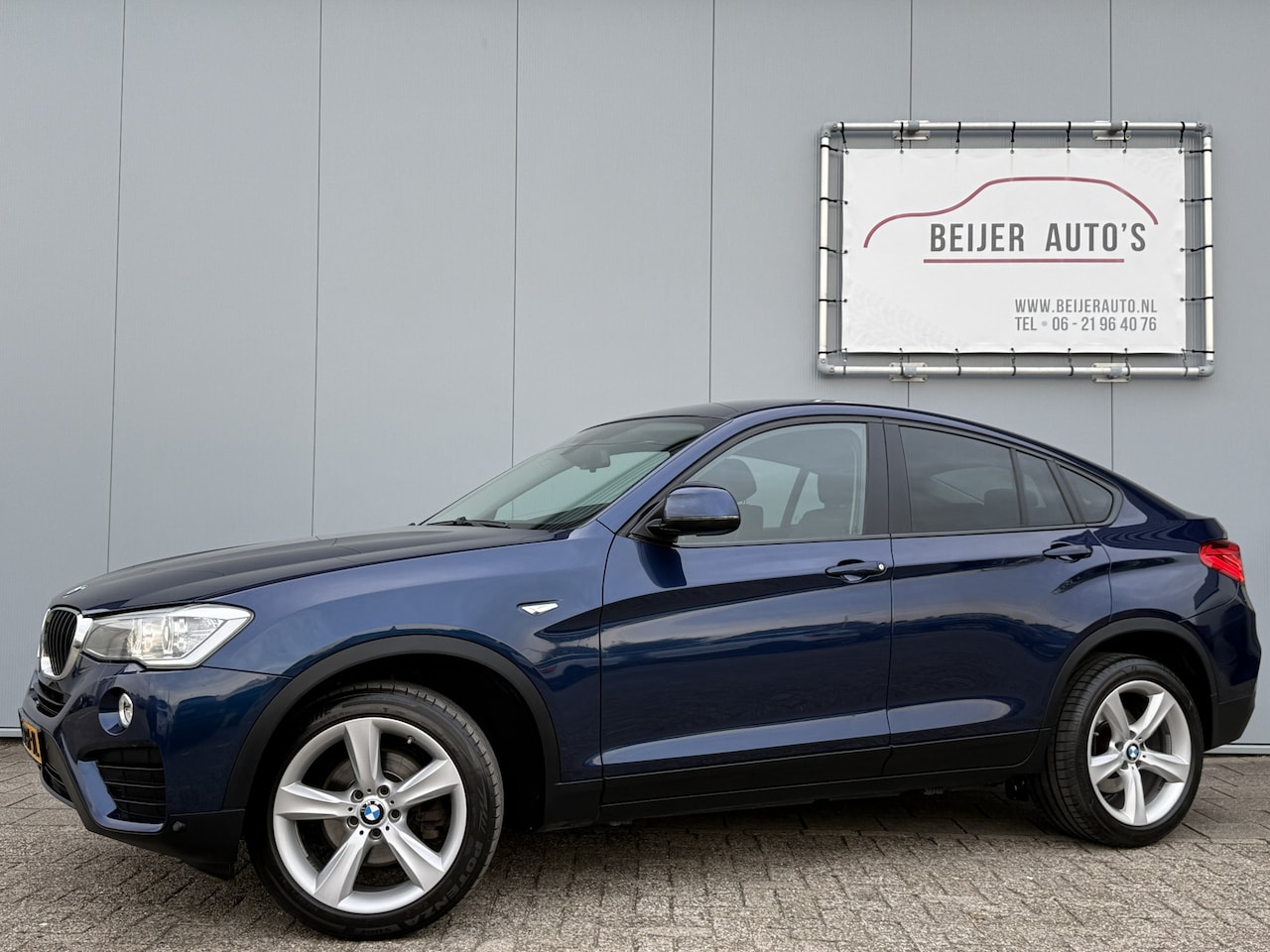 BMW X4 - xDrive20i Centennial High Executive Automaat Trekhaak. - AutoWereld.nl
