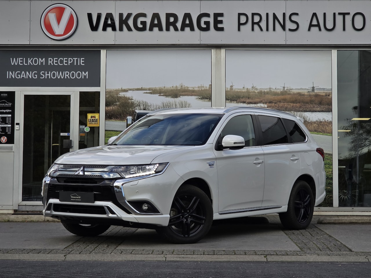 Mitsubishi Outlander - 2.4 PHEV Spirit 4WD |CAMERA|NAVI|STOELVERW.|DAB|CLIMA| 3898 - AutoWereld.nl