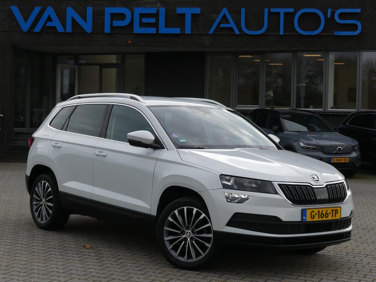 Skoda Karoq - 1.0 TSI 116PK DSG Ambition Business / Carplay / Stoelverw. - AutoWereld.nl