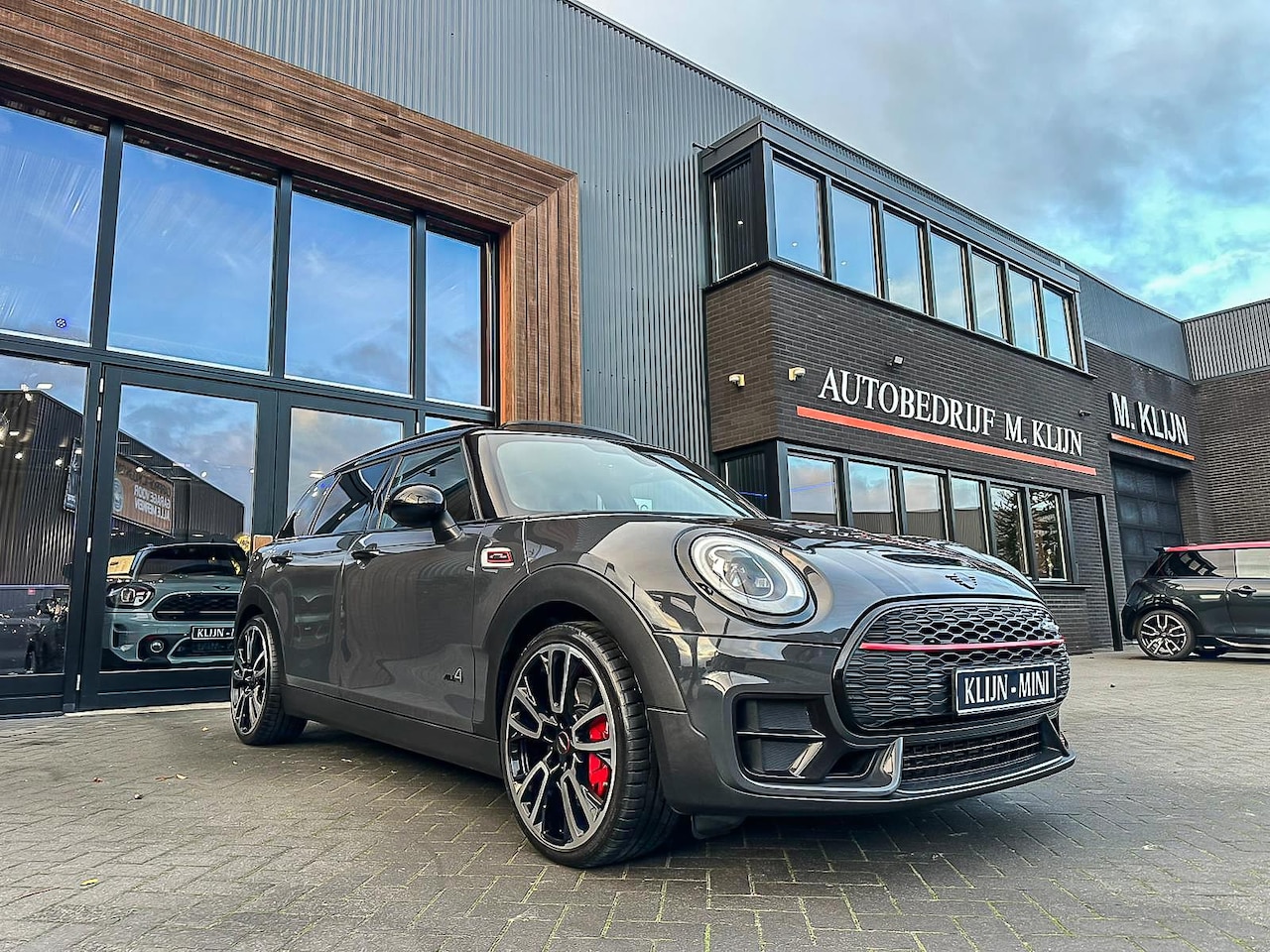 MINI Clubman - Mini 2.0 John Cooper Works ALL4 Chili F1 aut 231pk Blackline/Pano/Camera/HK - AutoWereld.nl